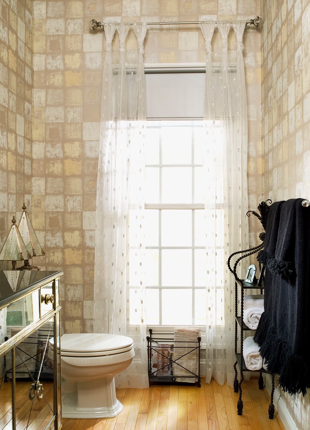 A Powder Room With a Touch Of Sparkle And Glam